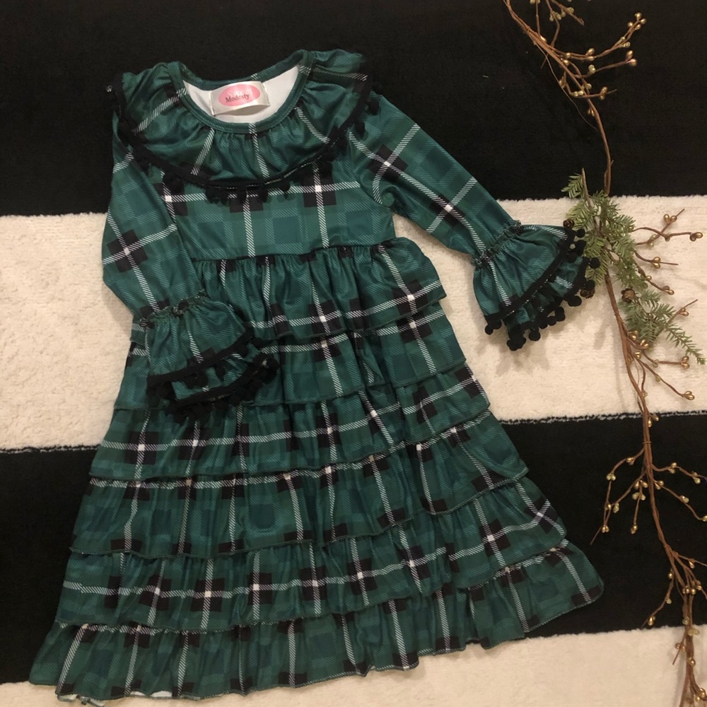 Girl’s green and black plaid dress